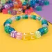 PlayBox: Színes fűzhető gyöngyszett henger alakú és kocka ABC 1000db-os csomag